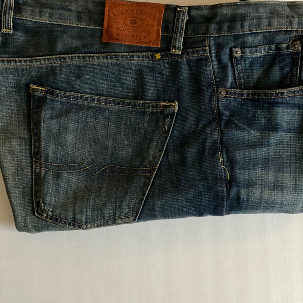 Two pairs of slight worn Lucky Brand jeans.
